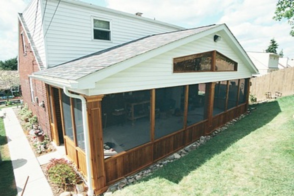 Outdoor View Of House With Screen In A Porch