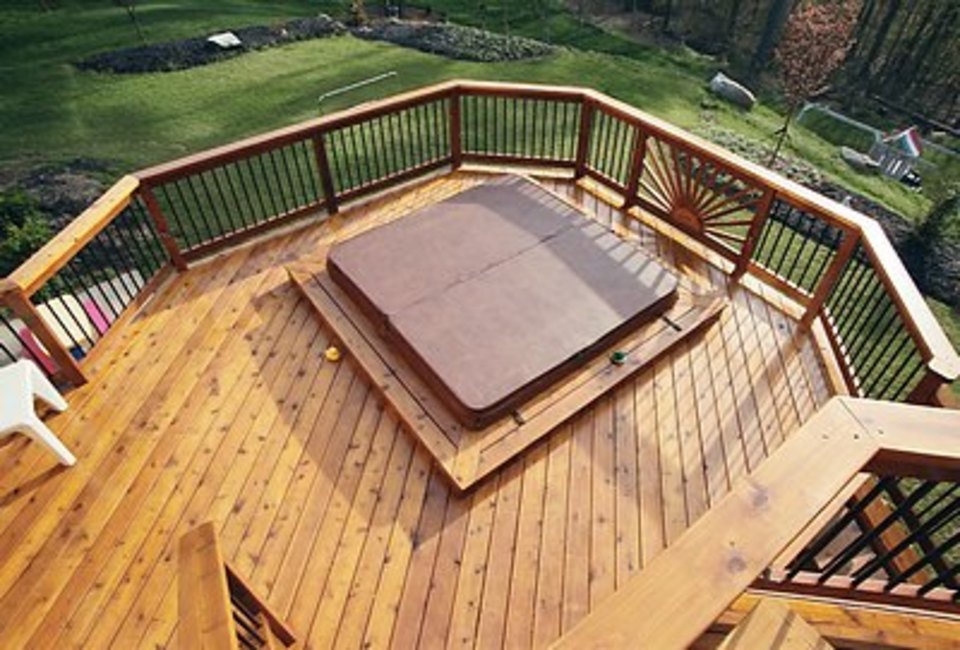 Wooden Deck With Covered Hot Tub