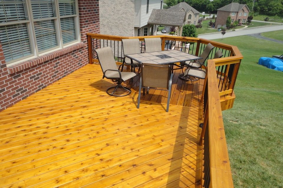 Outdoor Wood Deck With Chairs And Table